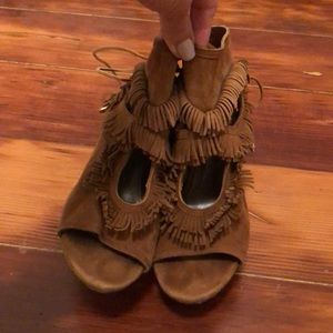 Suede boho Aquazzura tie back heels.